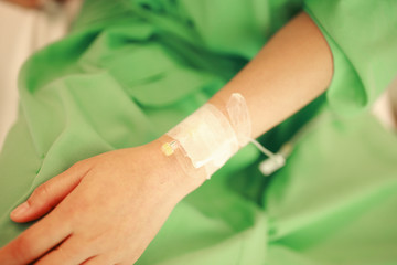 Selective focus Hand of patient in the hospital ward.