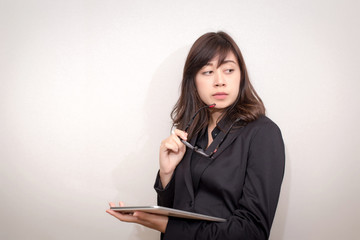 Naklejka premium Business woman using a touch pad (tablet). concept for business.