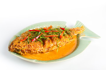 Traditional thai food, Fried fish toppted with spicy curry