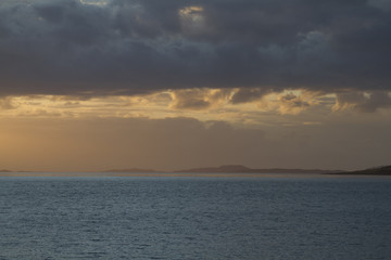 Naklejka na ściany i meble Sonnenuntergang an der Schottischen Westküste