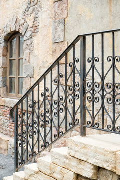 Ornate handrail of wrought iron