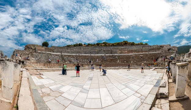 People visit Amphitheatre (Coliseum) at Ephesus historical ancient city, in Selcuk.High Resolution panoramic view.Izmir,Turkey:20 August 2017