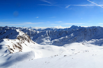 Mountain panorama with snow and blue sky in winter in Stubai Alps, Austria