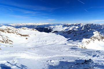 Obraz premium Mountain panorama with snow and blue sky in winter in Stubai Alps, Austria