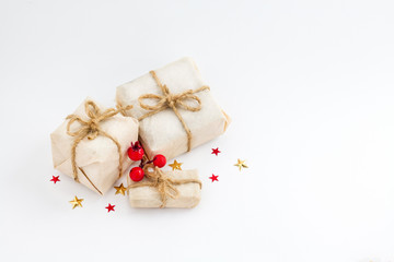 Obraz na płótnie Canvas Christmas gift box stars and mistletoe on white backgroundagainst. Holiday greeting card.
