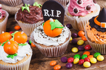 Halloween cupcakes with colored mastic decorations