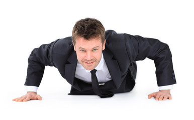 young businessman being wrung out from a floor
