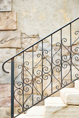 Ornate handrail of wrought iron