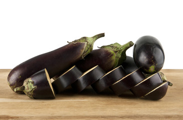 eggplant on a wooden table isolated on a white background