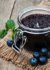 Jar with blueberry jam