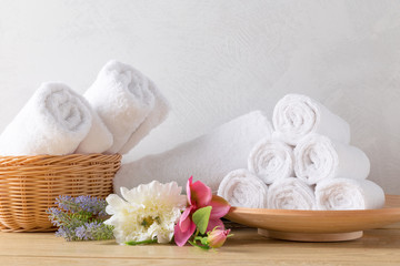 Fototapeta na wymiar towels roll with flower
