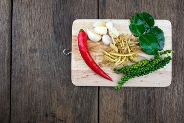 Field crab cooking ingredients on old wooden background