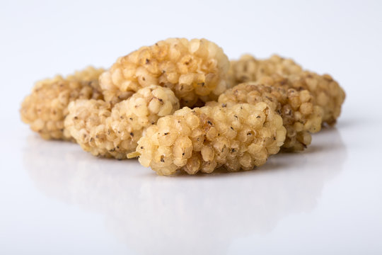 Close Up Shot Of Dried White Mulberries Fruits Isolated On White Background, A Healthy And Popular Sweet Snacks In Iran And Turkey