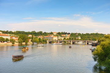 Prague panorama city skyline and far view of bridge, Prague, Czechia. Boat cruise on Vltava river
