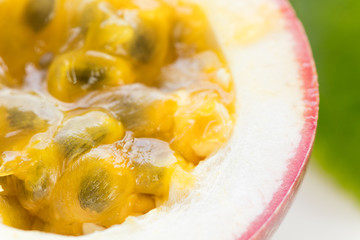 Ripe organic passion fruit cross cut, macro shot, selective focus