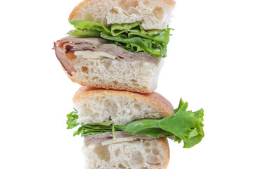 two pieces of sandwich on top of one and another