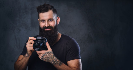 A man taking picture with a professional camera.