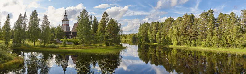 Finland landscape with forest and lake. Petajavesi church. Travel