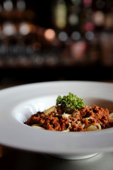 Spaghetti bolognese in dark tone