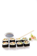 Futomaki sushi , Japanese roll rice egg avocado cucumber and caviar isolated in white background