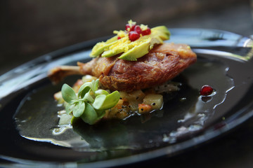 duck confit in black tone food