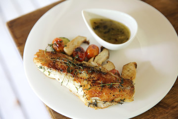 Sea bass fillet on wood background