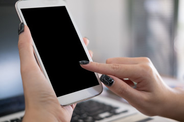 businesswoman use mobile phone at workplace. young woman texting message on smart phone at office. freelancer use cellphone for online network connection