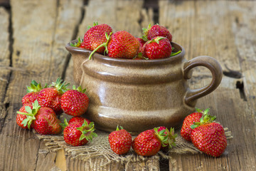 fresh strawberries in a pot