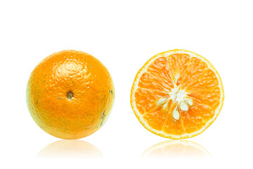Piece of orange show some texture detail with some seeds isolated on white background with Clipping path.
