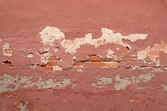 Muro antico rovinato di mattoni
