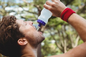 Close up of man drinking water