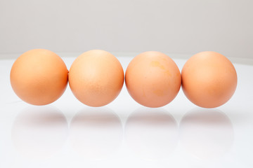 Close up of four egg isolated