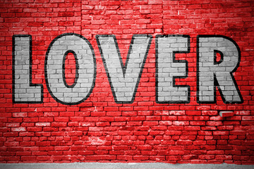 Lover Ziegelsteinmauer Graffiti