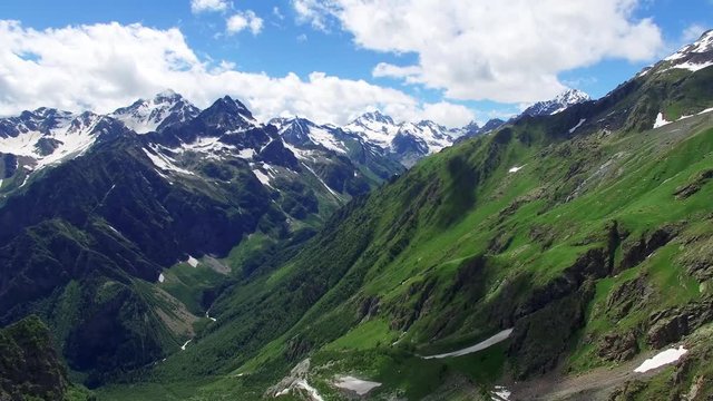 Flying near mountain range valley Aerial 4k video. Hiking Travel Tourism Caucasus Svaneti, Georgia.