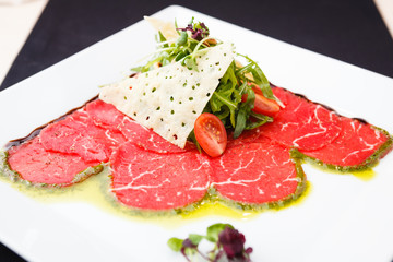 Beef carpaccio with salad