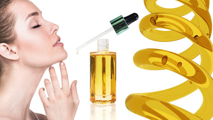 Cosmetic oil applying on face of young woman.