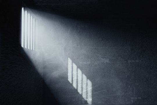 3d rendering of grunge prison cell with the shadows of stanchions projected on wall from light ray on window