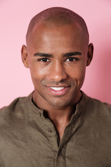 Close up vertical image of smiling african man