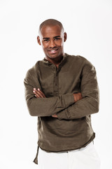 Handsome young african man standing isolated
