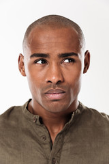 Obraz premium Vertical close up image of pensive man looking away