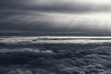 Aerial View Of Sea Of Gray Clouds Surrounded By Rays Of Light