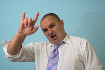businessman shows rocker