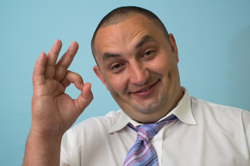Businessman shows ok