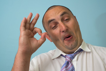 Businessman shows ok