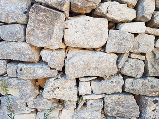 gray wall of stones background texture