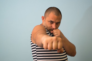 Man fist isolated on white