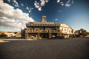 Vintage Old Wild West desert cowboy town with saloon