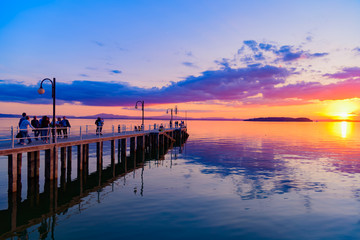 Fototapeta na wymiar sunset over Lake in Umbria Italy