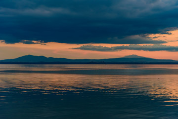 sunset over Lake in Umbria Italy