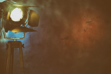 Illuminated, smoky stage light with copy space
